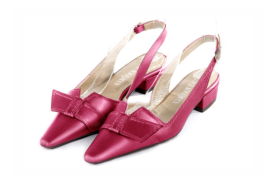 Women's fuchsia pink elegant slingback heels, with a bow on the front. Tapered toe. Low block heels - Front view